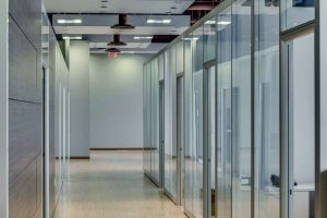 infusing office energy with glass partition walls